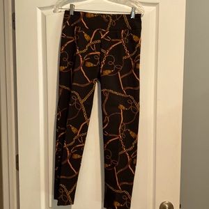 4P New Directions Pull on dress pants with unique chain and tassel print.